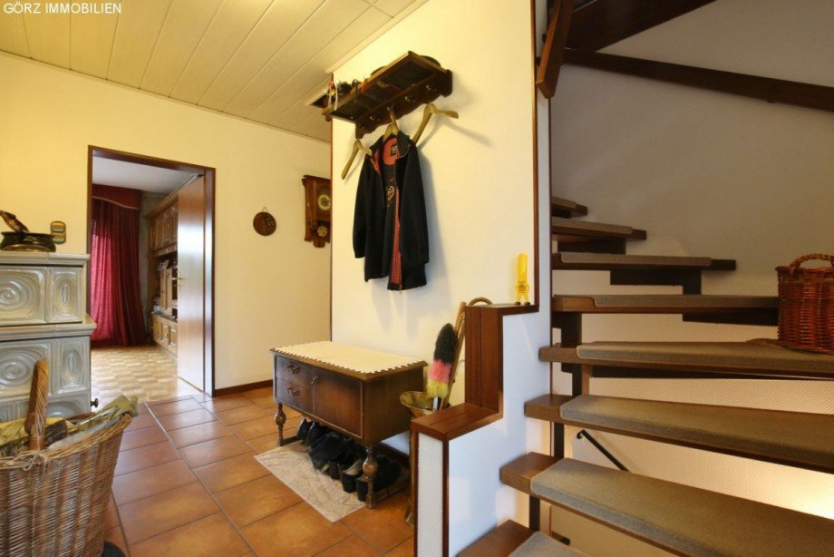 Eingangsbereich mit Treppenaufgang in das OG Einfamilienhaus Alveslohe