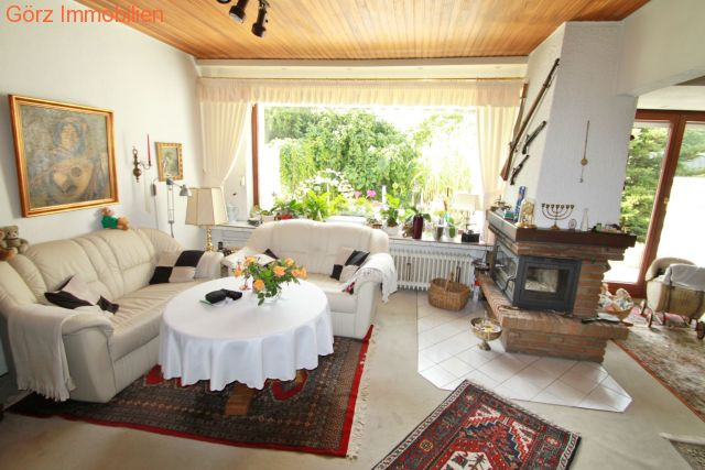 Das Wohnzimmer mit Kamin Doppelhaush�lfte Norderstedt