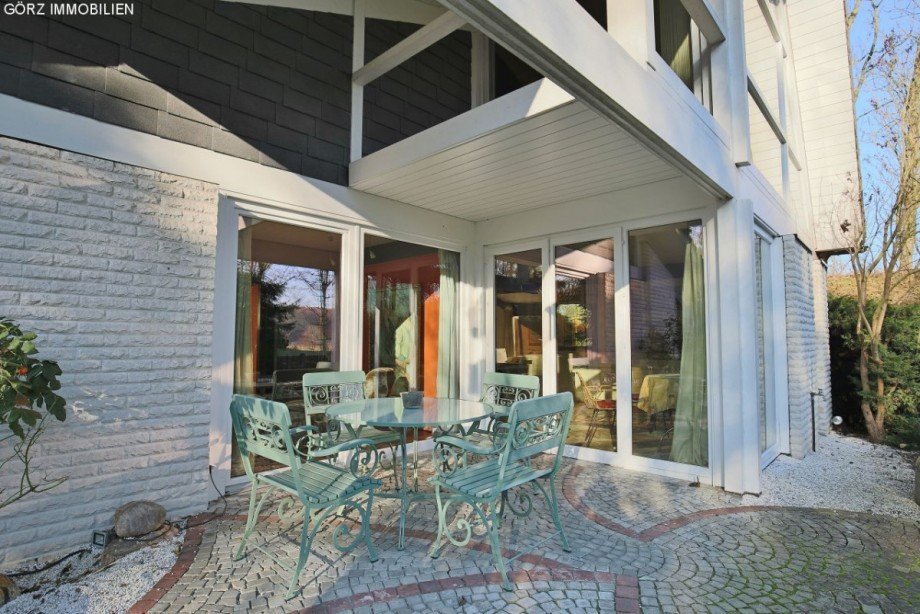 Terrasse vor dem Wohnzimmer und der K�che Einfamilienhaus Sieversh�tten