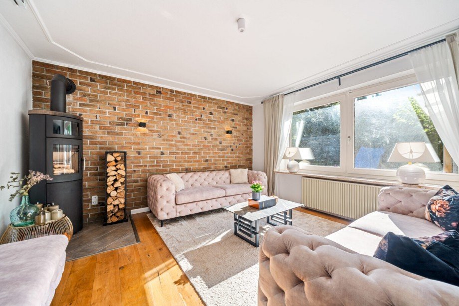 Wohnzimmer mit Kaminofen Einfamilienhaus Henstedt-Ulzburg