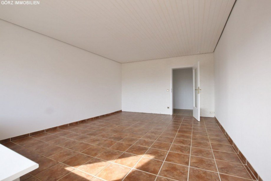Gefliestes Wohnzimmer Dachgeschosswohnung Henstedt-Ulzburg