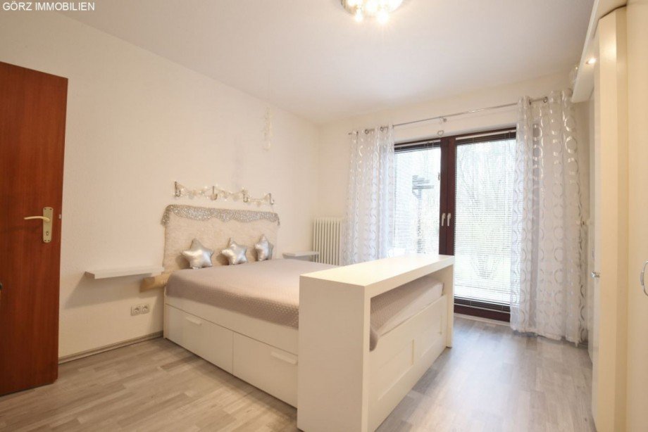 Schlafzimmer 1 EG mit Terrassenzugang Einfamilienhaus Elmenhorst