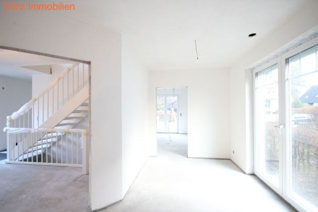 Wohnzimmer / K�che / Diele mit Treppe Einfamilienhaus Schenefeld