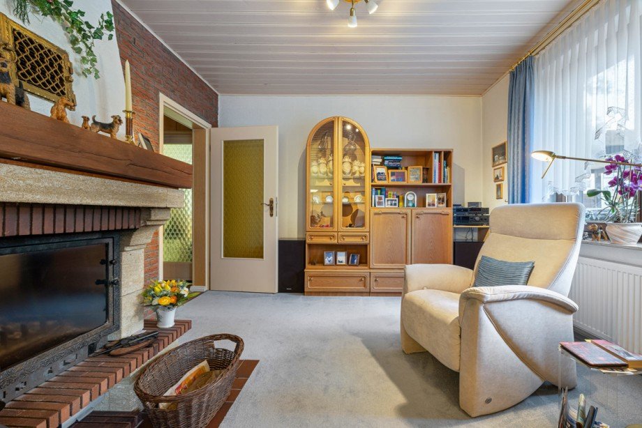 Wohnzimmer mit Kamin Zweifamilienhaus Hamburg