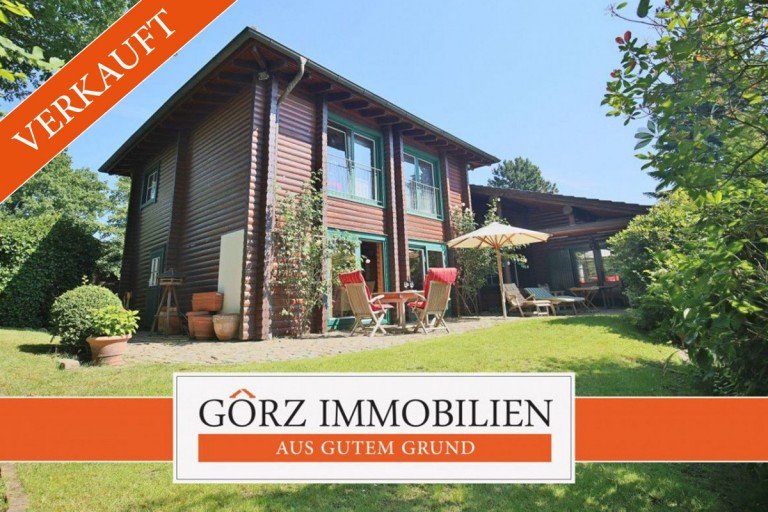 MC.G.22401 Kaltenkirchen Einfamilienhaus *VERKAUFT* Wohnen und Arbeiten unter einem Dach: Wohlfühlambiente im Blockbohlenhaus
