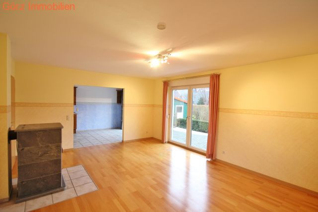 Das Wohnzimmer mit dem Kaminofen Zweifamilienhaus Barmstedt
